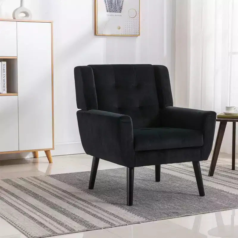 Poltrona d'accento in velluto grigio con braccioli, seduta singola, gambe in legno nero
