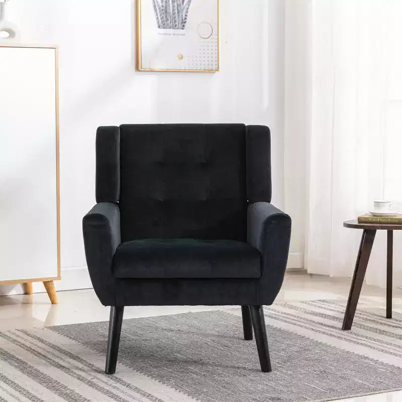Poltrona d'accento in velluto grigio con braccioli, seduta singola, gambe in legno nero