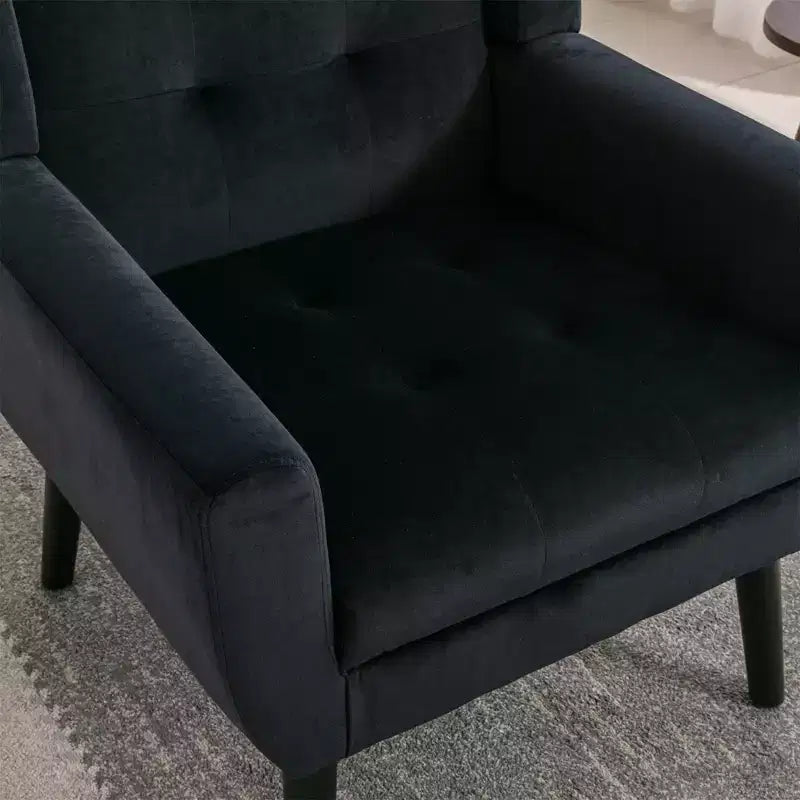 Poltrona d'accento in velluto grigio con braccioli, seduta singola, gambe in legno nero